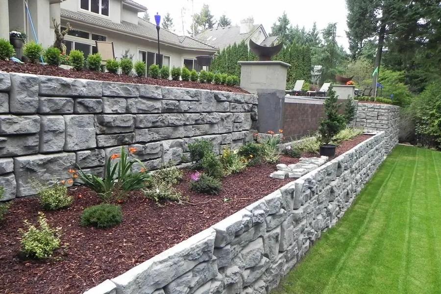 Aerial view of a landscaped yard with a stepping-stone path and planting beds